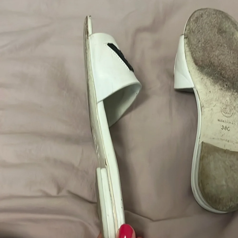 CHANEL White Slides with Black Lettering